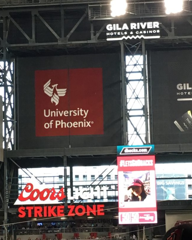 Getting her 15 seconds of fame at Chase Field billboard.